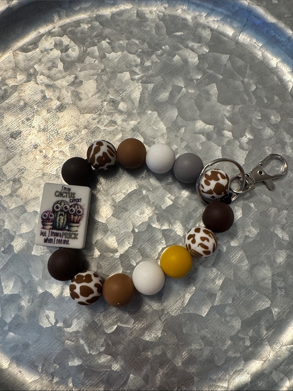 Beaded Wrist Keychain with Cow-Print Accent - Brown, White & Yellow